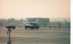 Moto's Silver AE86 and Jumbo jet.jpg (104126 bytes)